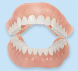A removable full upper and lower denture set